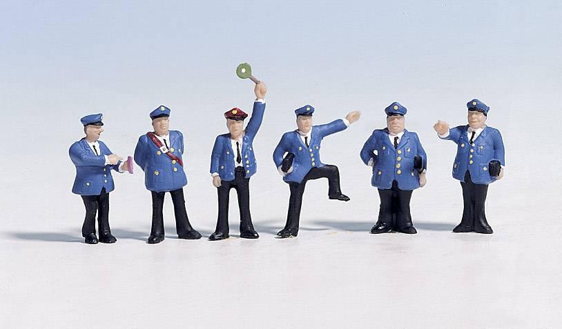 Six figurines de modèle en uniforme bleu, alignées ; différentes poses, l'un d'entre eux tenant une clé en l'air.