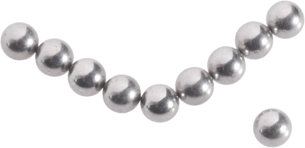 Huit boules de métal argentées forment une ligne légèrement incurvée, une boule est séparée sur le côté droit.