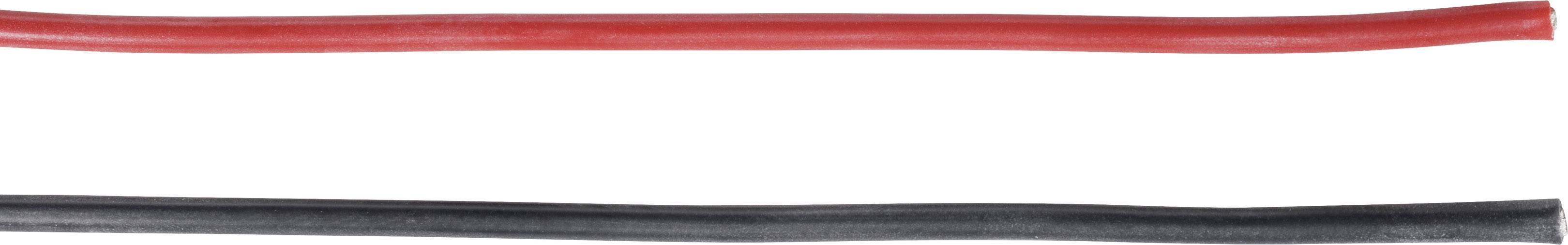 Deux fils isolés, rouge en haut et noir en bas, sont disposés parallèlement l'un à côté de l'autre. Ils symbolisent les pôles positif et négatif.