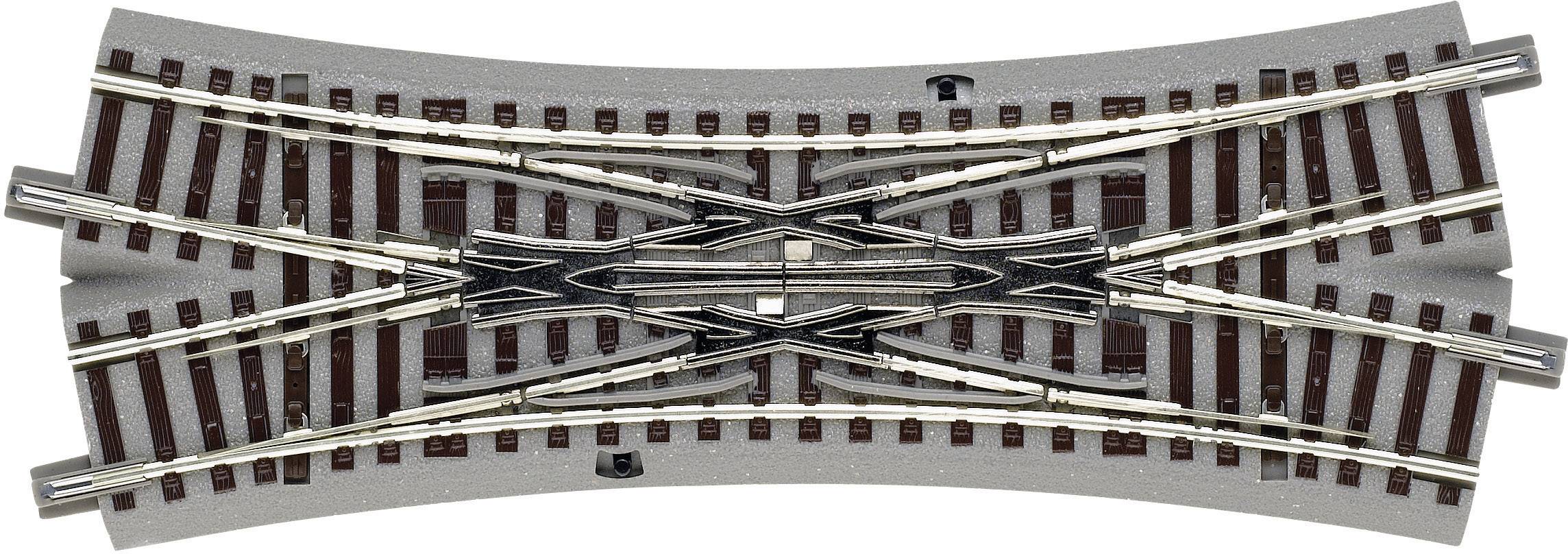 Aiguillage de modélisme ferroviaire avec plusieurs connexions de rails permettant de changer de direction. Comprend deux voies principales et des connexions transversales.