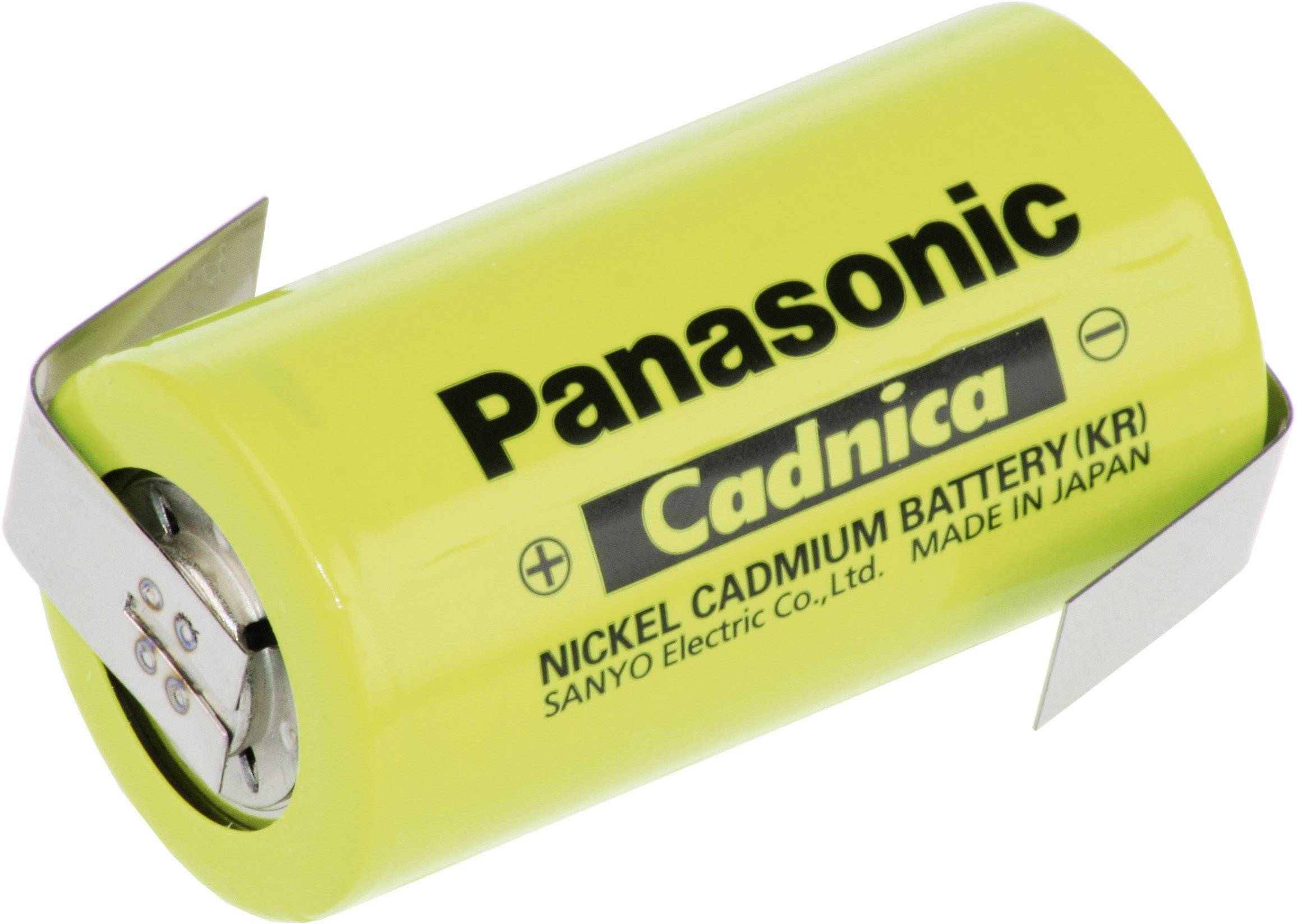 Une batterie Nickel-Cadmium Panasonic Cadnica avec un boîtier jaune et des pattes métalliques, fabriquée par SANYO Electric Co., Ltd. au Japon.