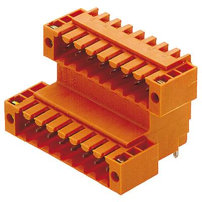 Connecteur orange à bornes multiples. Convient aux connexions électriques dans les armoires électriques ou les appareils.