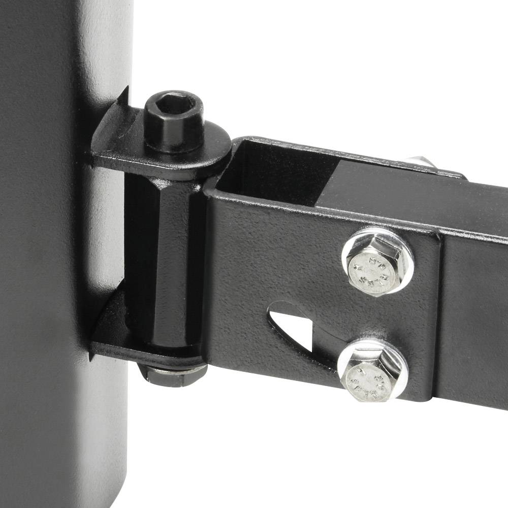 Gros plan d'une articulation métallique noire avec des vis reliant deux pièces. Elle illustre une construction robuste, probablement un élément de meuble ou d'appareil.