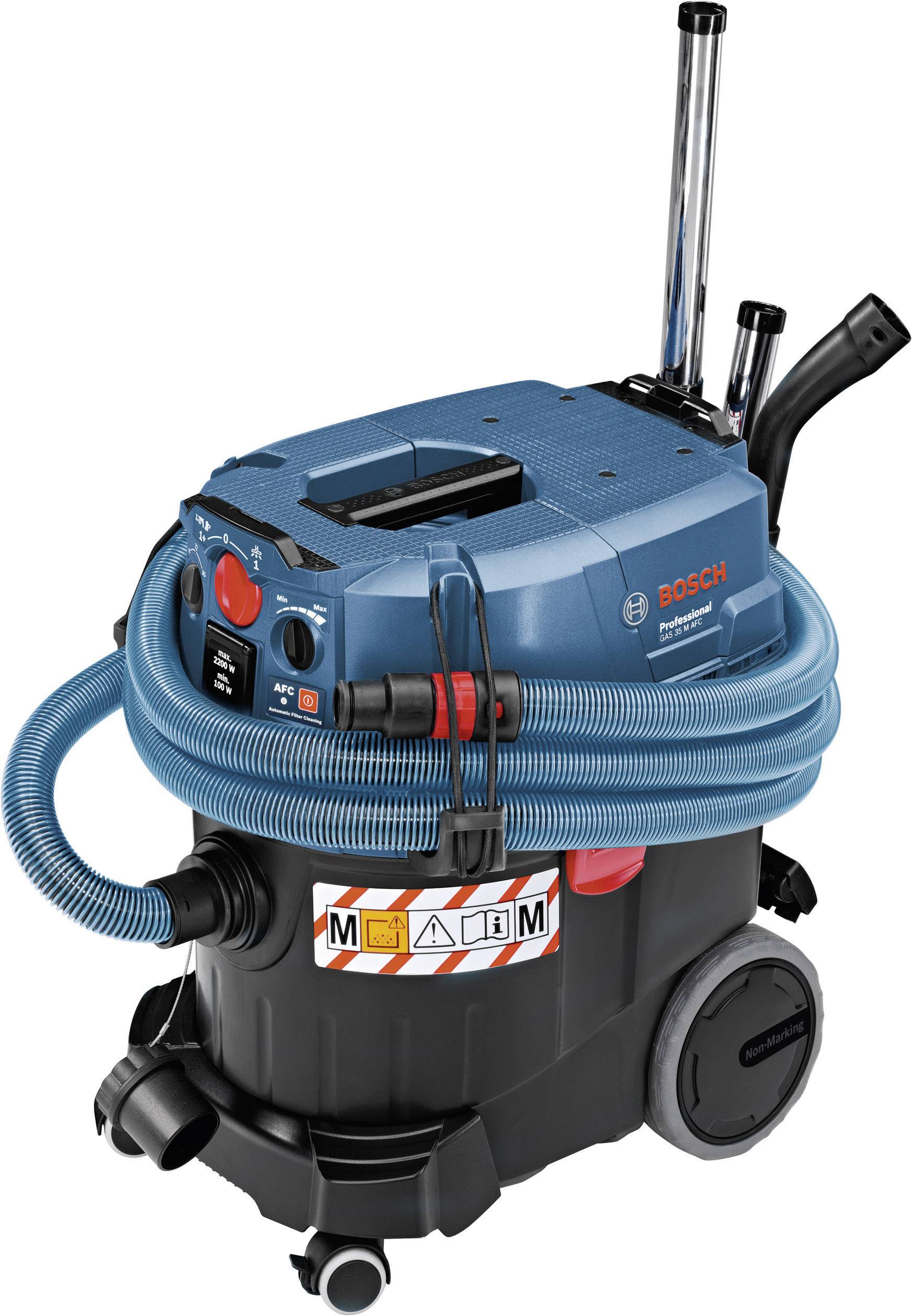 Aspirateur industriel avec boîtier bleu et tuyau enroulé. Marque 'Bosch', modèle pour nettoyage sec et humide.