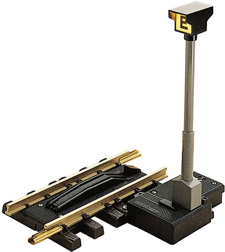 Signal de train miniature et section de rail. Le signal principal est placé sur une base reliée aux rails. Idéal pour les réseaux de modélisme ferroviaire.