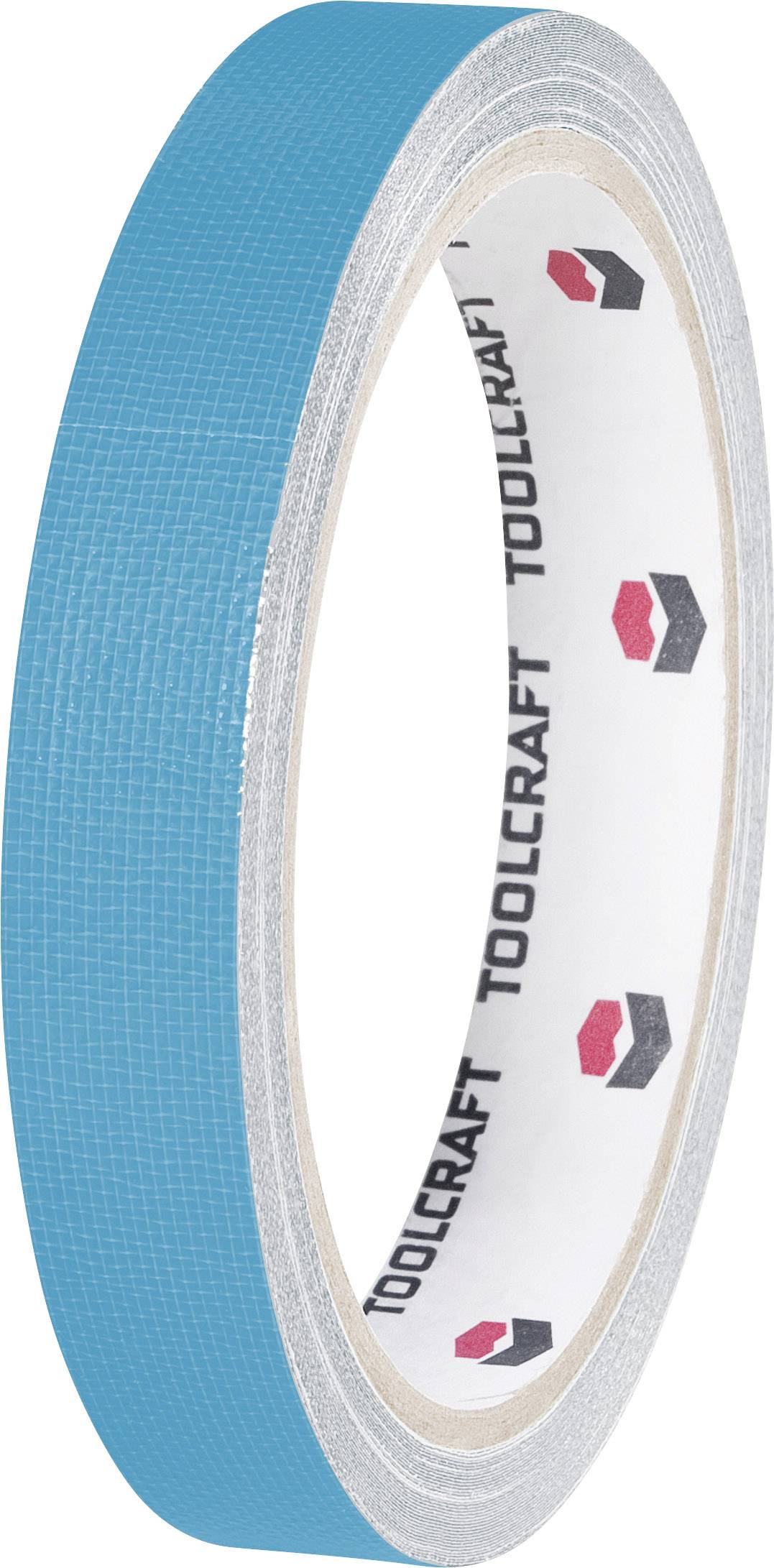 Un ruban adhésif bleu portant l'inscription 'Toolcraft' sur l'intérieur du rouleau. Il est utilisé pour masquer ou fixer des matériaux.