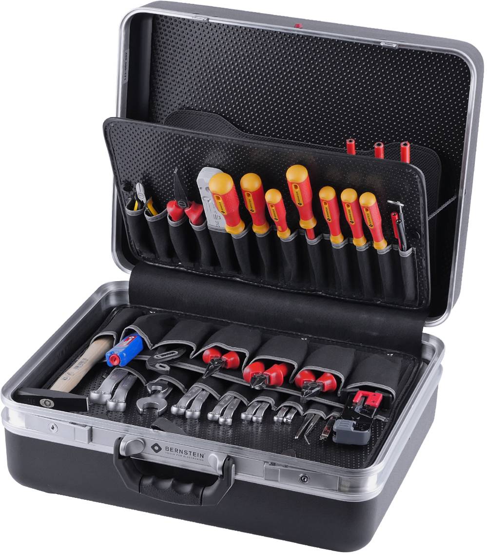 Boîte à outils contenant différents tournevis, pinces et autres outils, soigneusement rangés dans des compartiments.