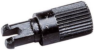 Outil en plastique noir à surface striée et deux dents, probablement utilisé comme outil de connexion ou d'adaptation.
