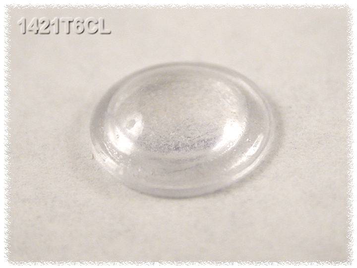 Une petite coupole en plastique transparente, semi-sphérique, repose sur une surface claire. En haut à gauche est inscrit '1421T6CL'.