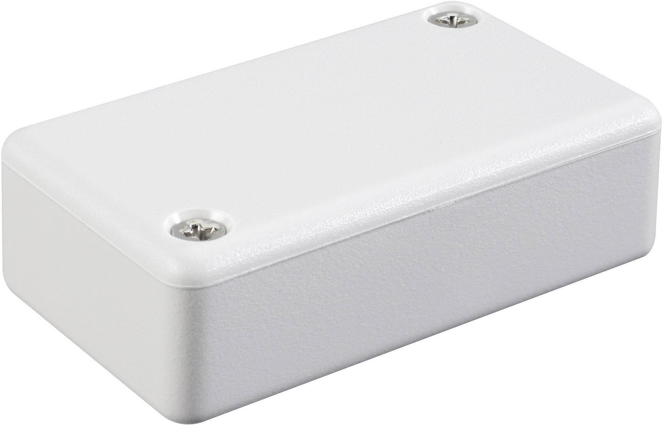 Un boîtier rectangulaire blanc en plastique, doté de deux vis visibles sur le dessus pour la fermeture.