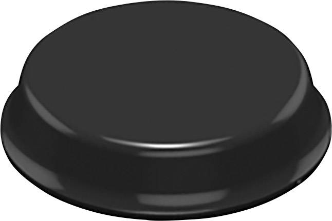 Un objet noir, rond et plat, probablement un couvercle ou un dessous de verre en plastique, sur un fond uni.