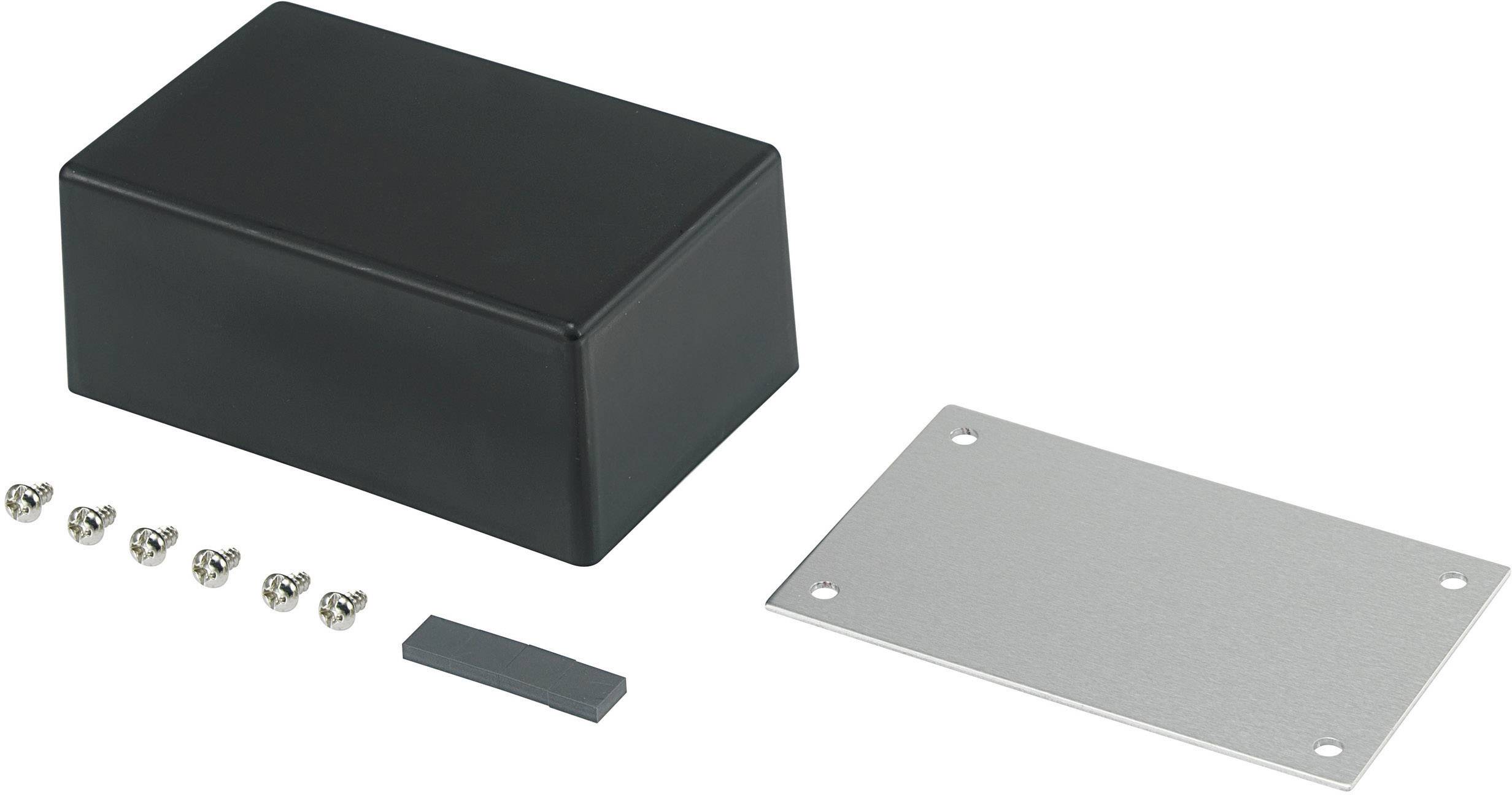 Un boîtier rectangulaire noir avec un couvercle métallique amovible, six vis et un petit accessoire gris.