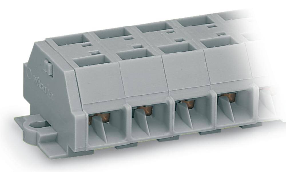 Un connecteur électrique rectangulaire gris avec plusieurs bornes, utilisé pour raccorder des lignes électriques.