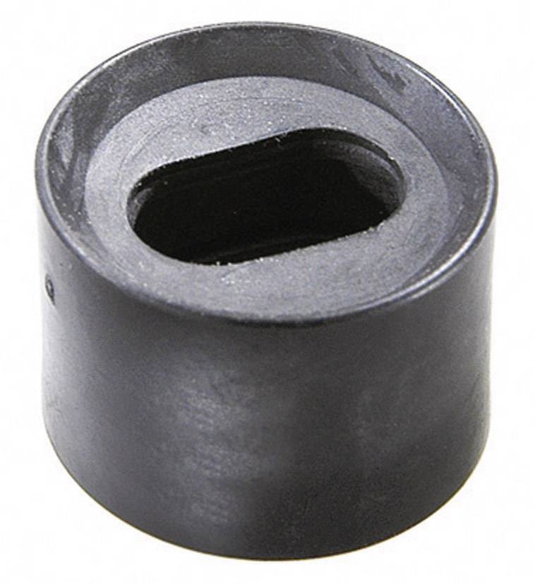 Adaptateur noir, cylindrique, avec une découpe ovale sur le dessus.