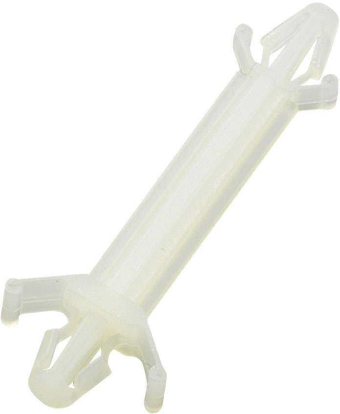 Un chevillet en plastique blanc, cylindrique, avec quatre bras en forme de palette pour la fixation dans les murs en plaques de plâtre.