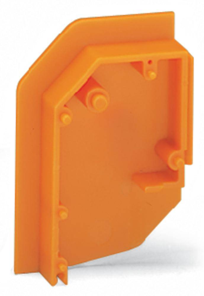 Un composant rectangulaire en plastique orange avec plusieurs arêtes et saillies, probablement une partie d'un boîtier ou d'un couvercle de protection.