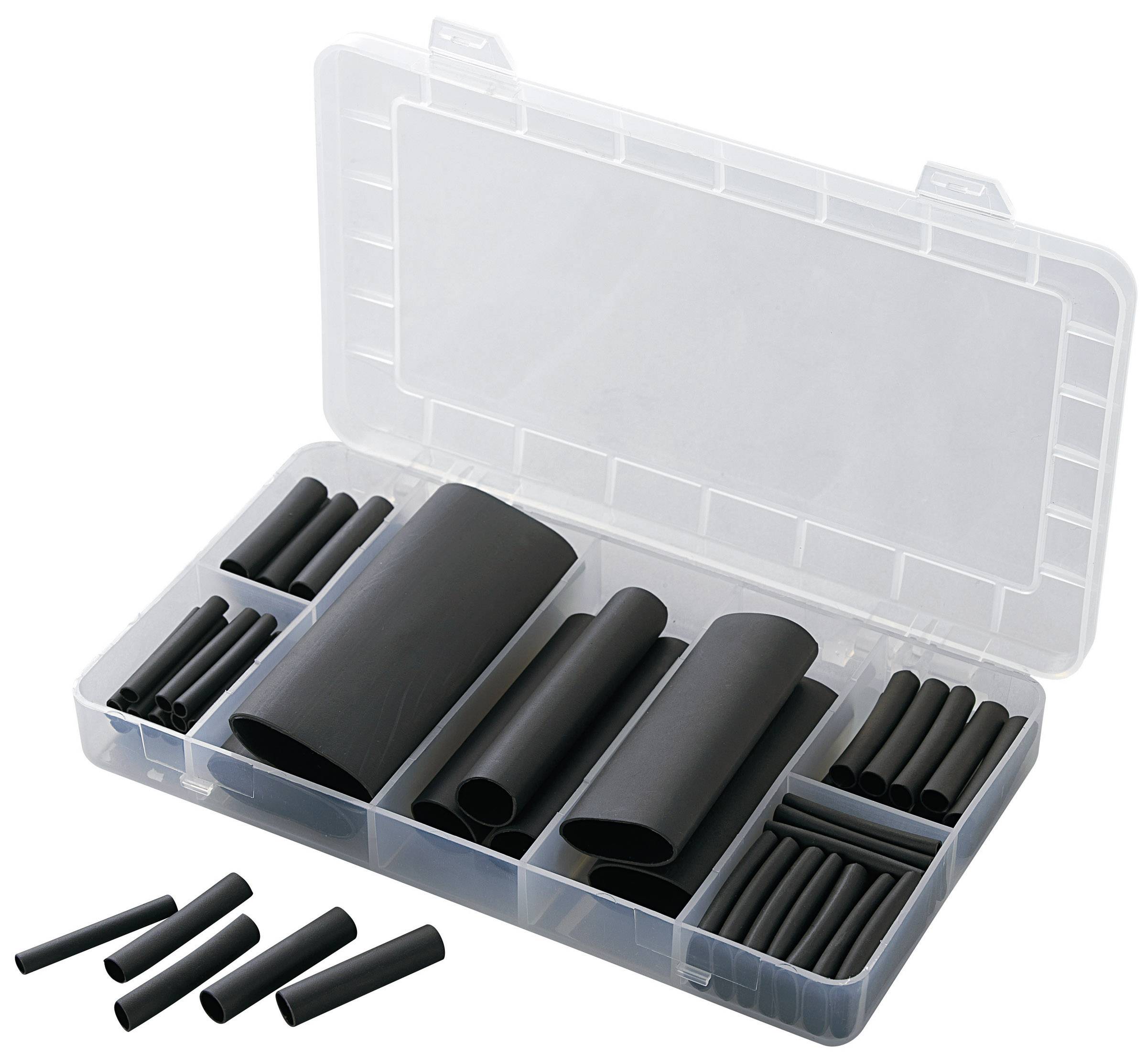 Une boîte en plastique transparent contient différents tubes thermorétractables noirs de plusieurs tailles.