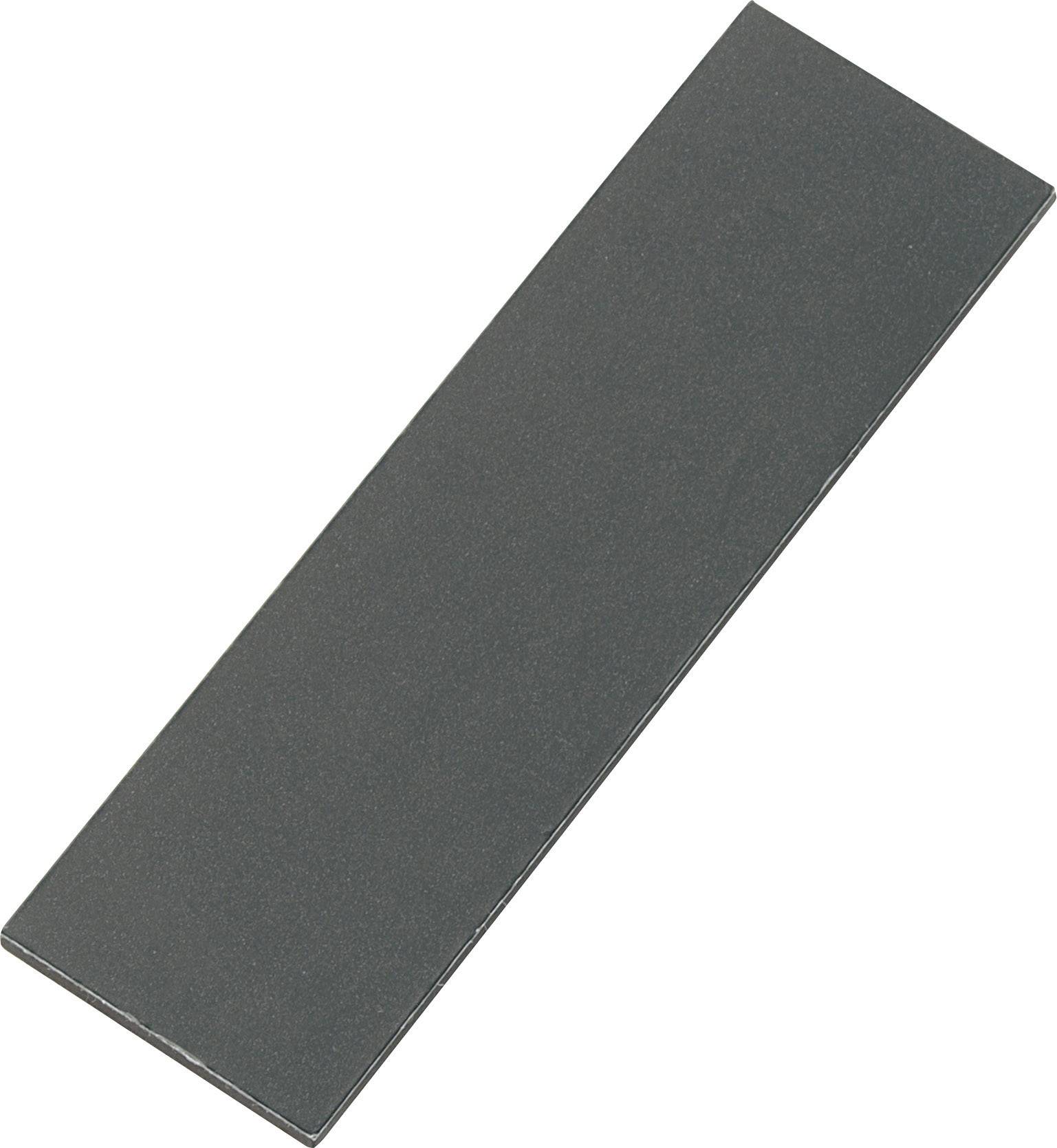 Pierre à aiguiser gris foncé, rectangulaire, positionnée selon un angle diagonal.