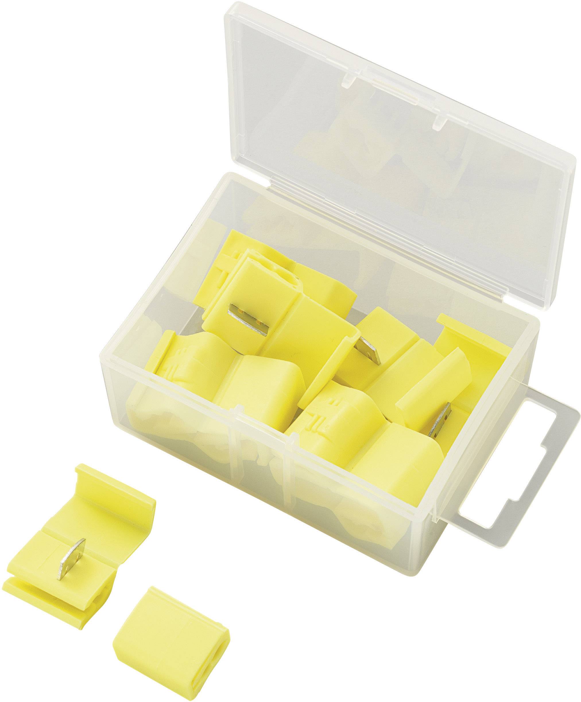 Un récipient transparent contient de nombreuses pinces de câble jaunes en forme de U avec des pointes métalliques, accompagnées d'une pile supplémentaire de pinces à côté.