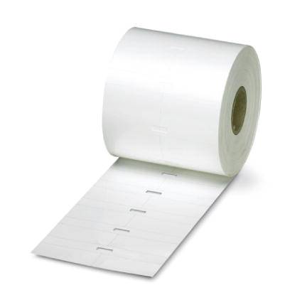 Un rouleau d'étiquettes en papier, debout, avec plusieurs sections d'étiquettes perforées visibles.