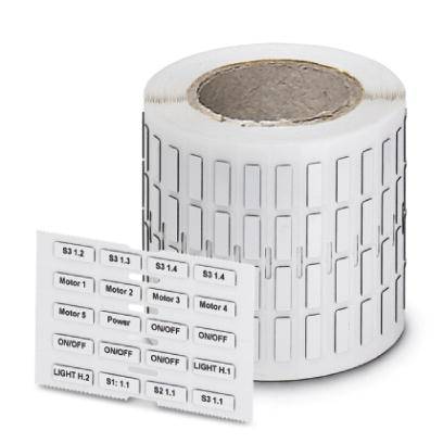 Un rouleau d'étiquettes autocollantes avec des languettes rectangulaires prédécoupées. Une étiquette affiche des textes tels que 'Moteur', 'Puissance', 'Marche/Arrêt'.