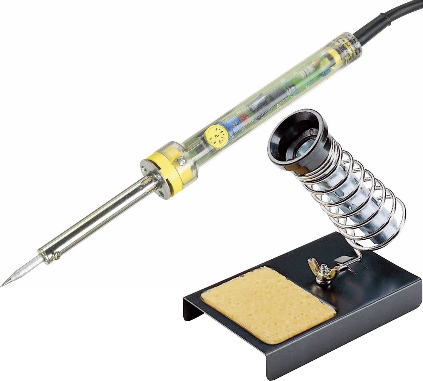 Un fer à souder avec une poignée transparente montre le circuit interne. À côté se trouve un support spiralé et une éponge de nettoyage.