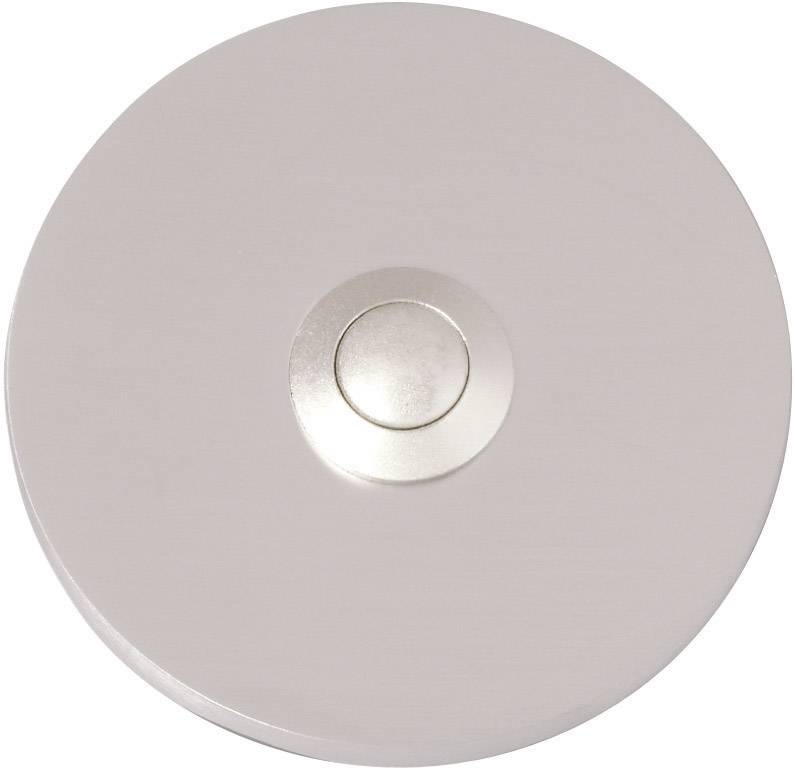 Bouton-poussoir rond en argent, placé de manière centrale, sur un fond mat.