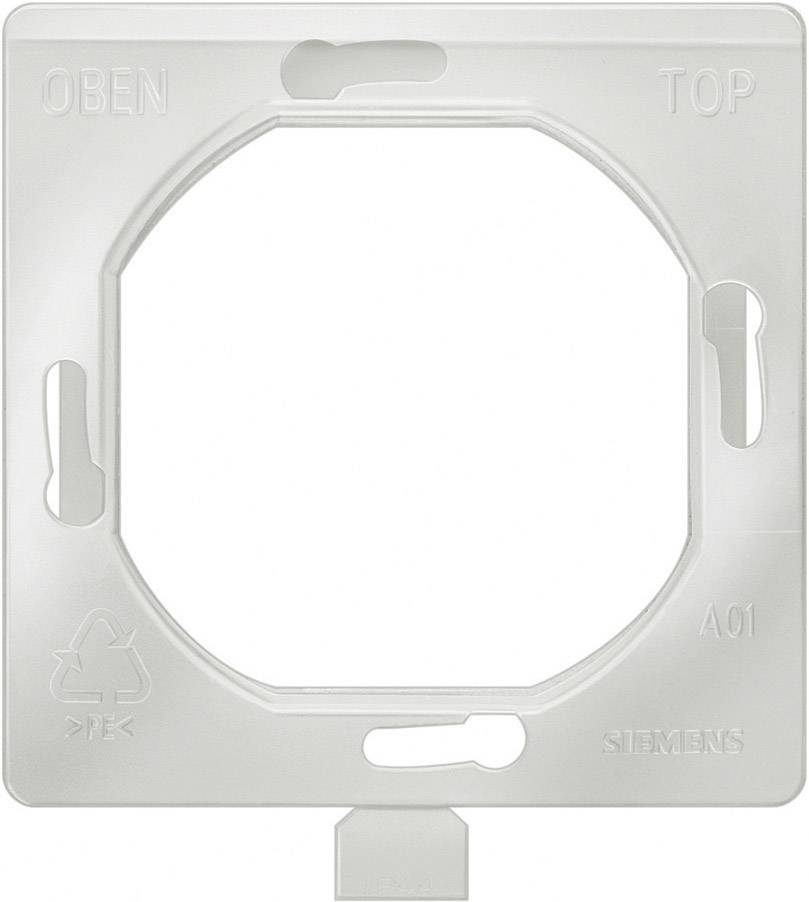 Un support en plastique blanc de Siemens portant la mention « HAUT TOP ».