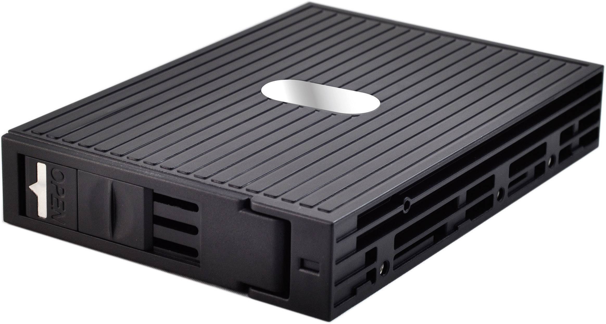 Cassette noire avec sillons, similaire à un lecteur de bande, de forme rectangulaire. Adaptée au stockage de données, sans marquages visibles.