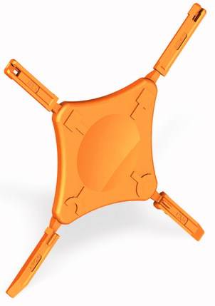 Un insert en plastique orange, en forme de croix, possiblement un élément de connexion ou un stabilisateur, isolé sur un fond blanc.