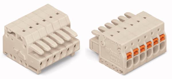 Deux connecteurs beiges à plusieurs broches. Celui de droite présente des insertions oranges dans les ouvertures, adaptés aux connexions électriques.