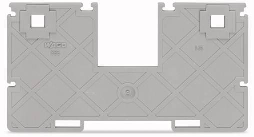 Une cloison rectangulaire grise en plastique avec des découpes carrées et un motif géométrique, marquée 'WAGO'.
