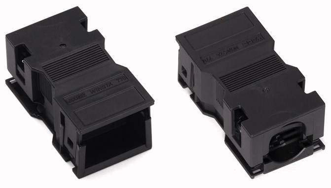 Deux modules en plastique noir côte à côte, l'un montrant le recto, l'autre le verso, probablement destinés à des connexions électroniques.