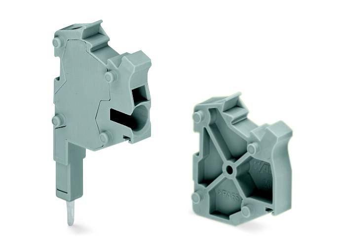 Deux éléments en plastique gris, l'un vertical avec connexion à vis et l'autre posé à plat, tous deux destinés à des connexions électriques.