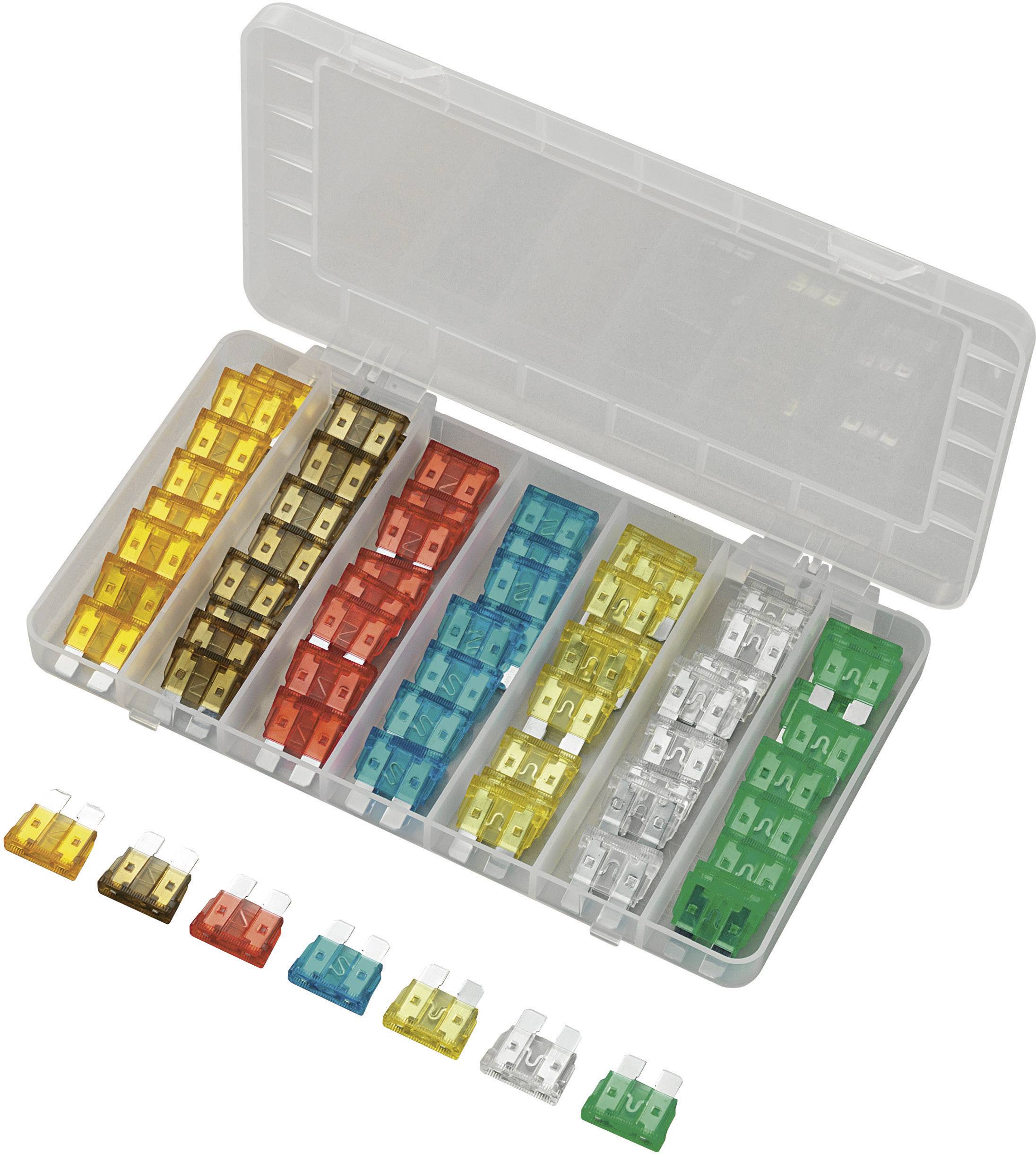 Une boîte en plastique transparent contenant différents fusibles plats de couleurs, triés par compartiments.