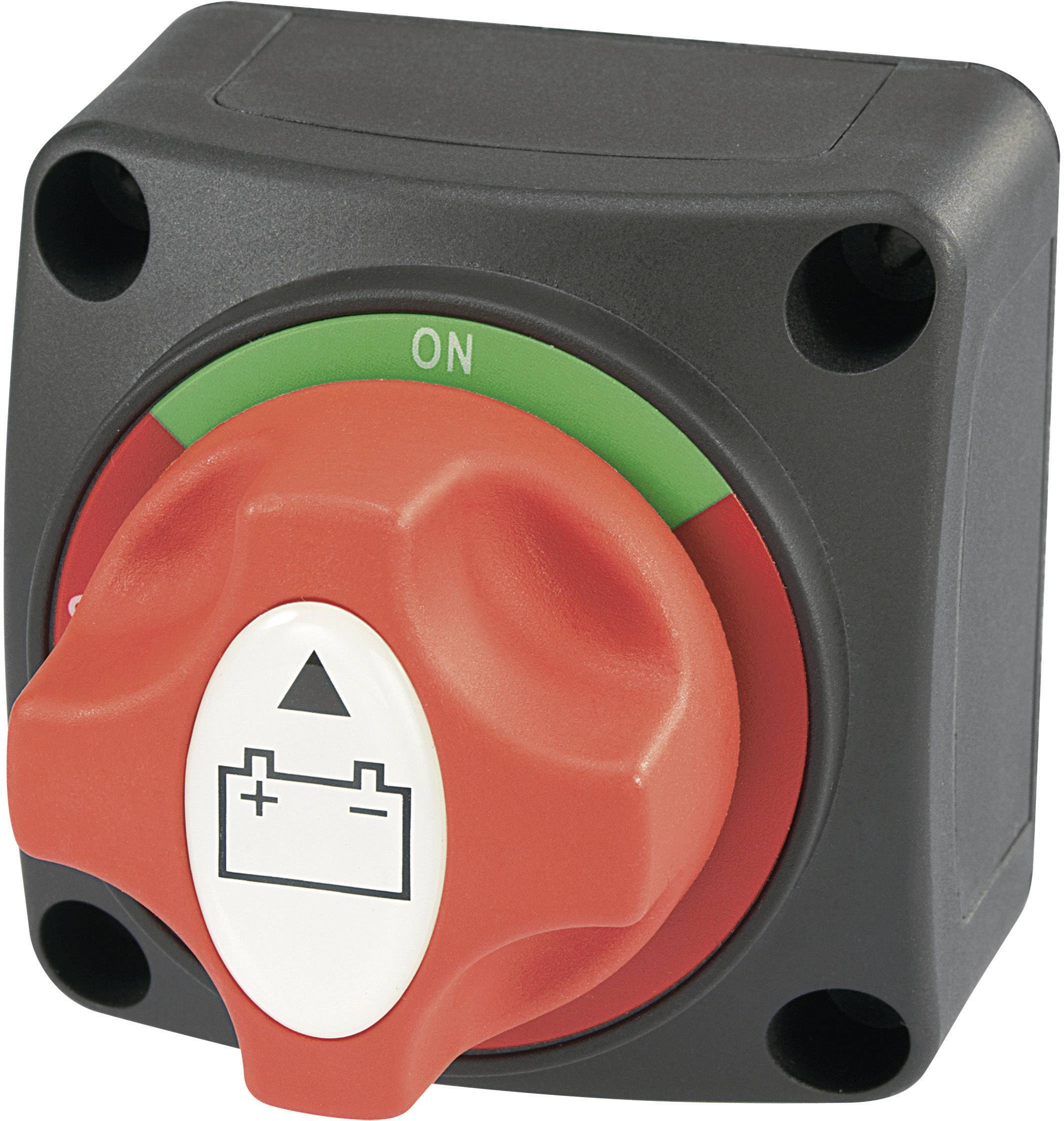 Interrupteur de batterie rouge avec indicateur fléché sur un symbole blanc. L'interrupteur est en position 'ON', entouré d'un cercle vert et rouge, monté sur un boîtier noir.