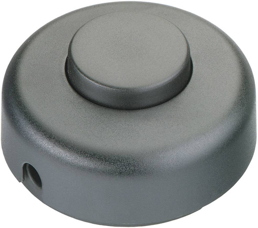 Un bouton-poussoir gris, rond, de couleur noire.