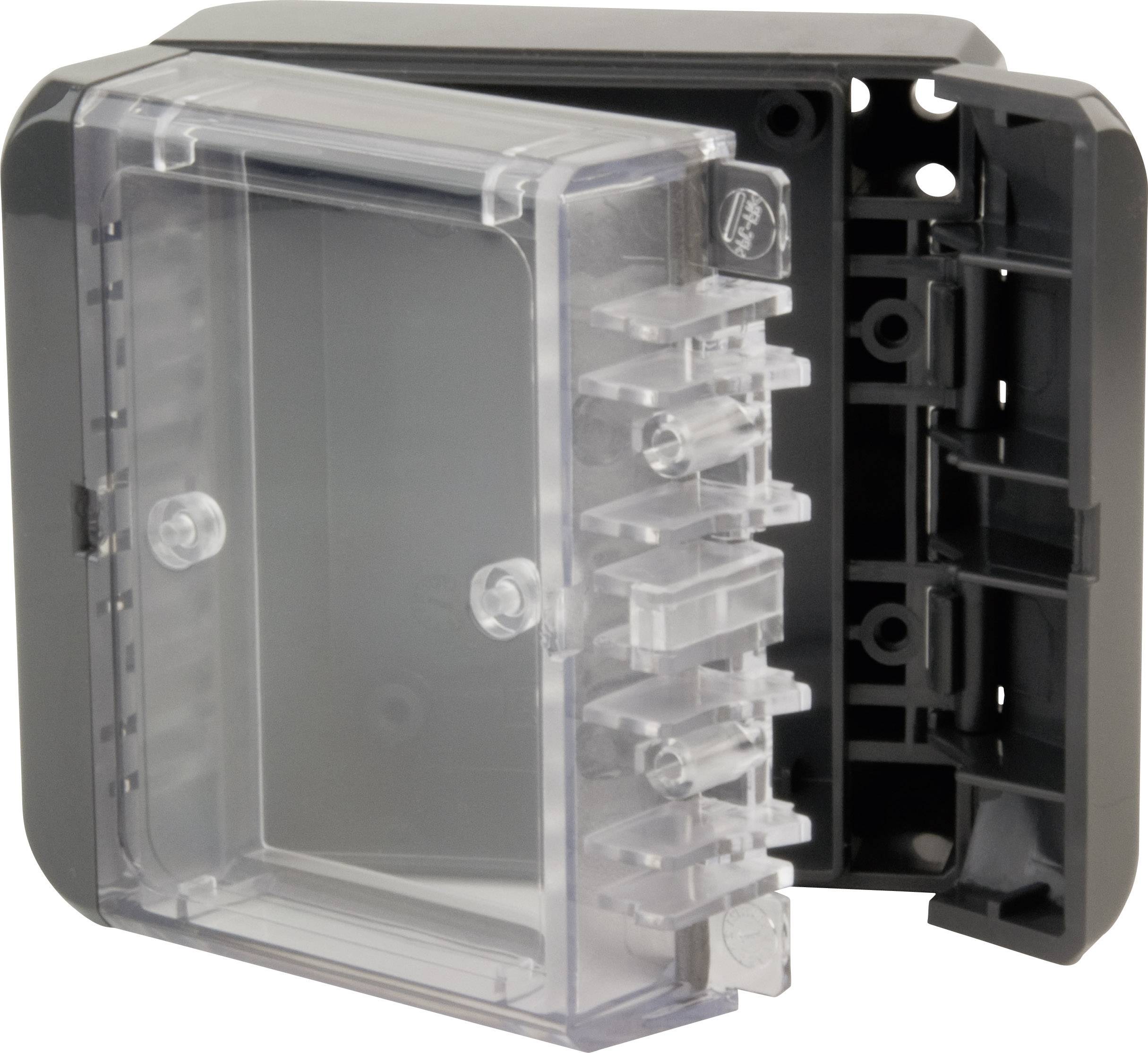 Un boîtier en plastique gris, rectangulaire, avec un couvercle transparent est partiellement ouvert, laissant apparaître sa structure interne et ses supports.