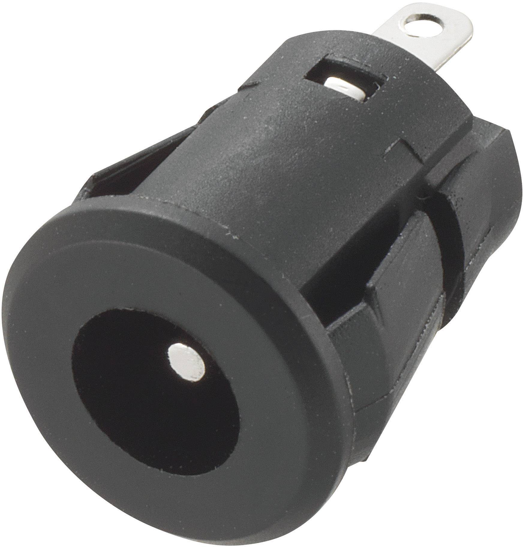 Un adaptateur de connexion réseau noir, cylindrique, avec deux broches argentées.