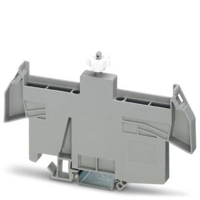 Élément en plastique gris avec des attaches métalliques, probablement un module de connexion électrique, posé sur une surface blanche.