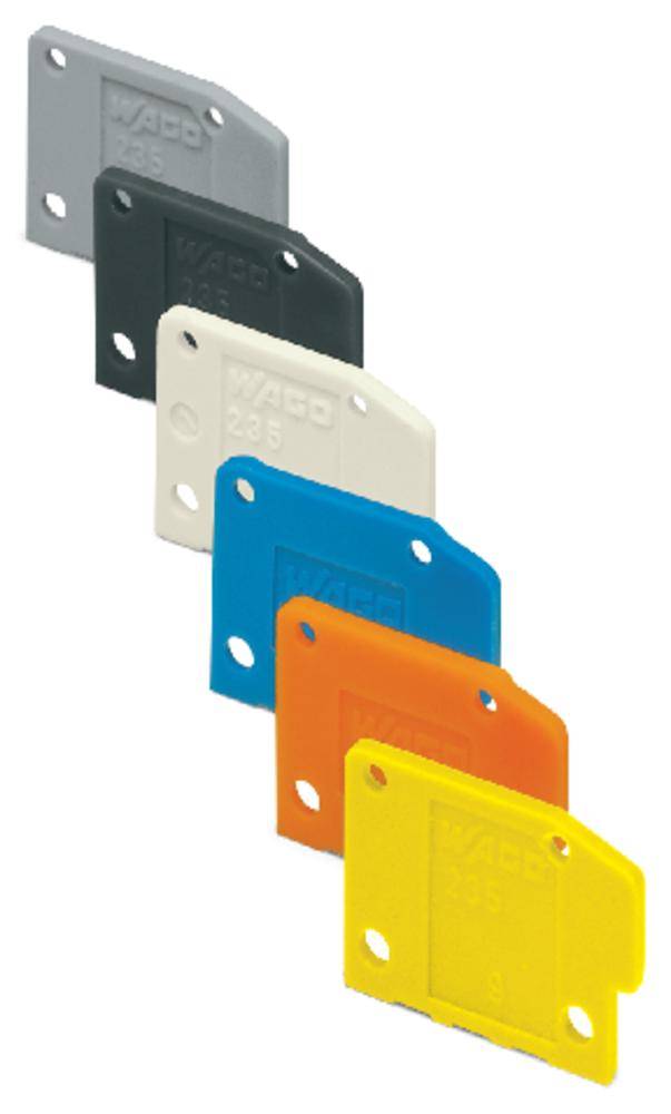 Six plaques en plastique colorées de différentes couleurs et tailles, empilées les unes sur les autres, avec des trous de perçage aux coins.