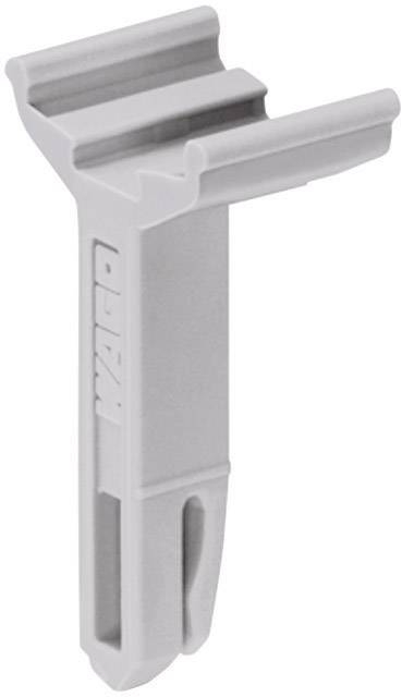 Une pièce grise en plastique à pointe dentelée, ressemblant à un support ou à un élément de fixation. Elle présente des fentes verticales et un marquage en relief.