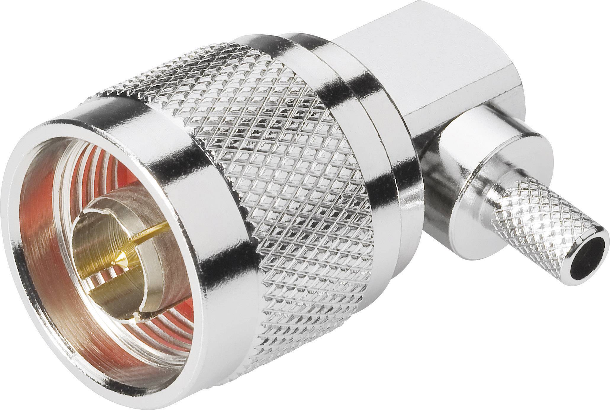 Connecteur coaxial métallique à angle droit avec un boîtier cannelé et un contact doré pour applications RF.