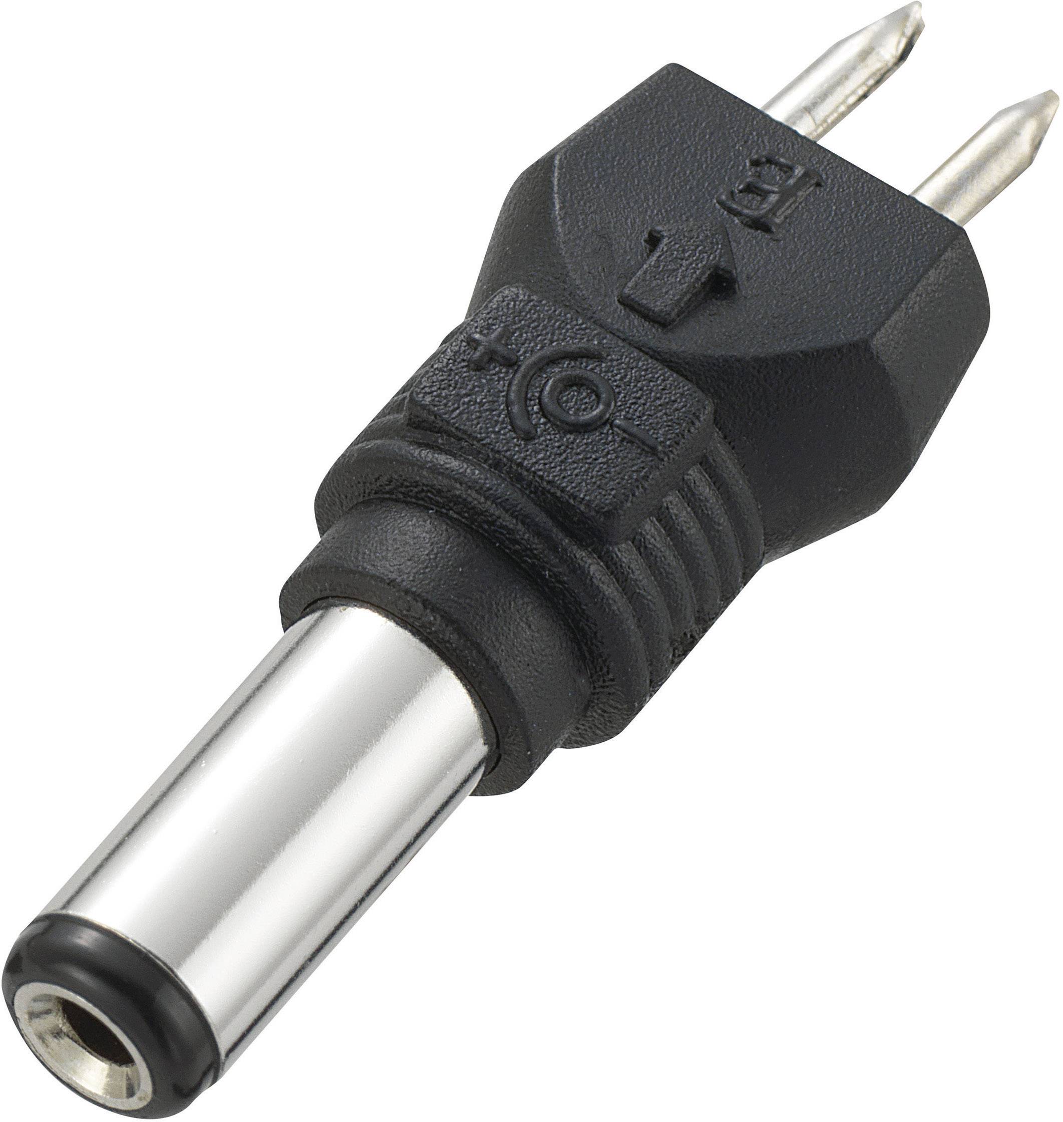 Un adaptateur noir avec deux fiches rondes et un connecteur cylindrique, typique des prises électriques européennes.