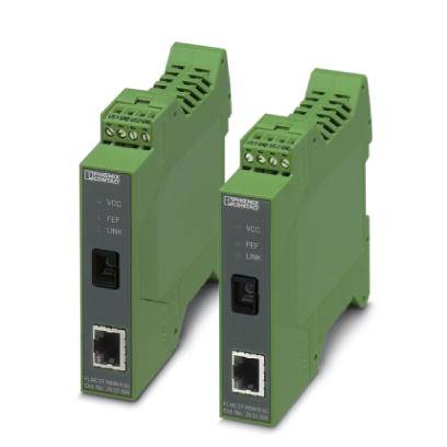 Deux modules d'interface Ethernet industriels verts côte à côte. Ils possèdent des connexions pour VCC, FG et Link.