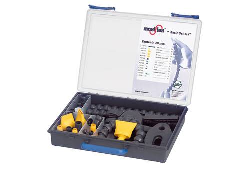 Coffret à outils 'MaxiFlex' de 20 pièces, triées par couleurs. Une liste du contenu est imprimée sur le couvercle.