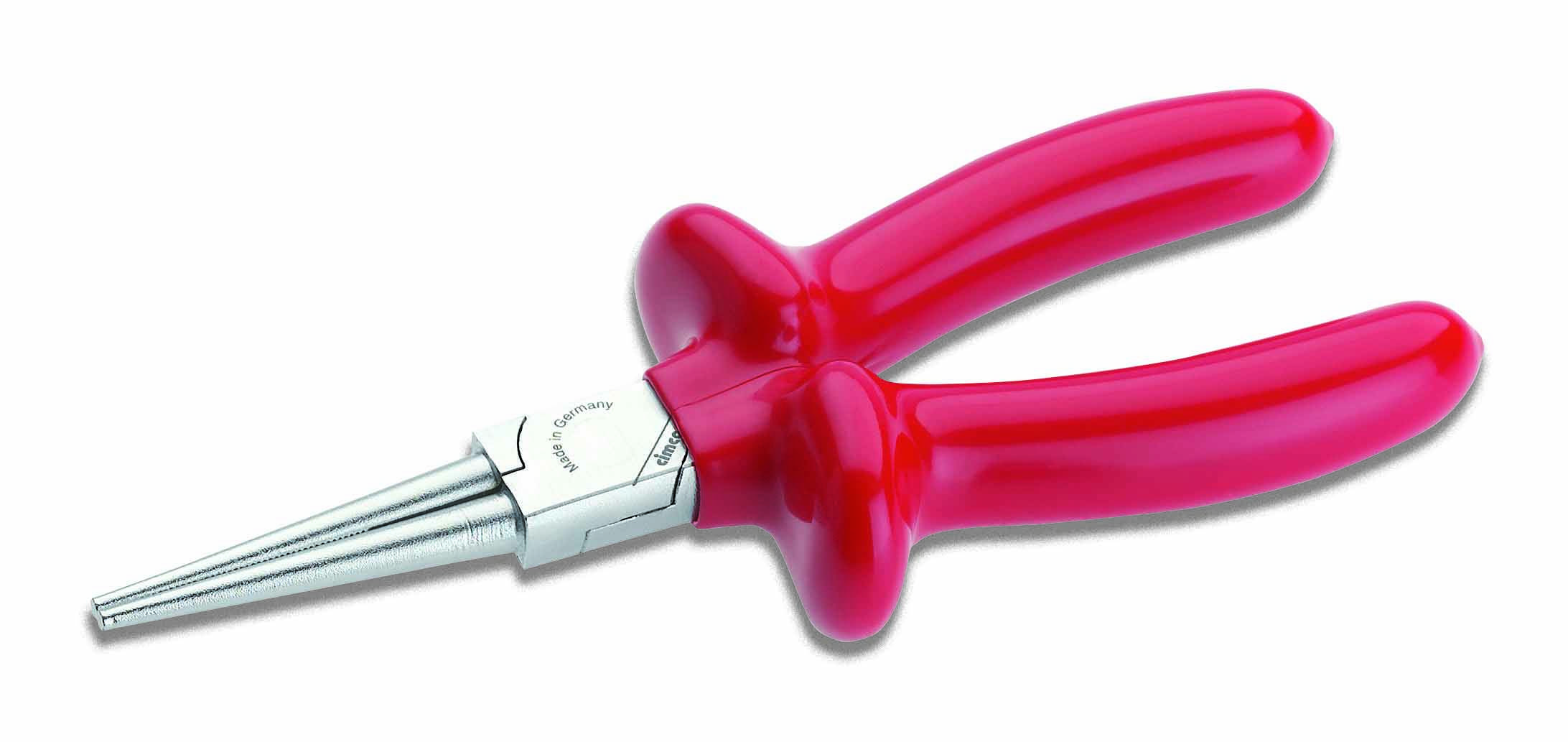 Une pince ronde rouge avec des pointes métalliques, posée sur une surface blanche.