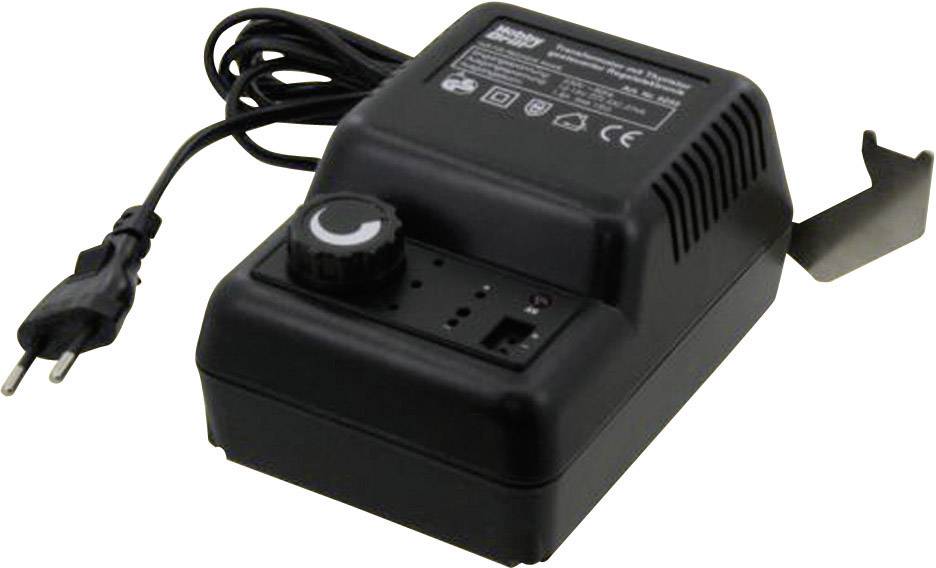 Régulateur de tension noir avec bouton rotatif et câble, adapté pour la technique des modèles réduits ferroviaires. Contient une étiquette avec des données techniques sur le dessus.