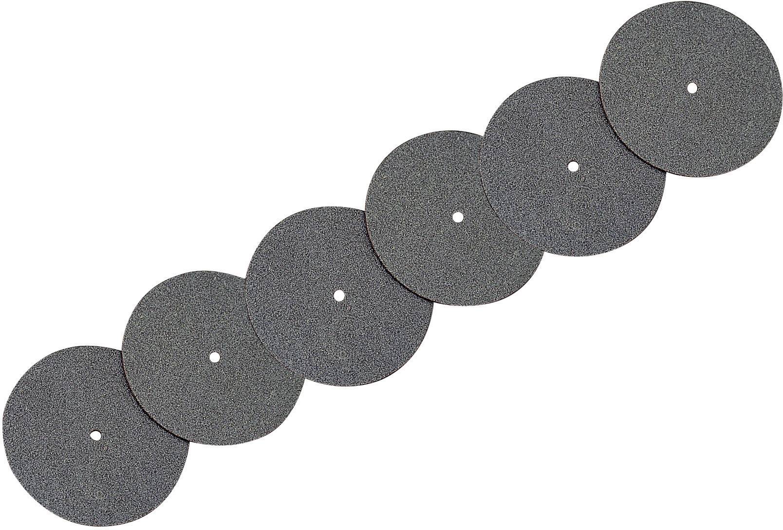 Cinq disques de meulage gris foncé sont disposés en ligne diagonale, chacun avec un trou en son centre.