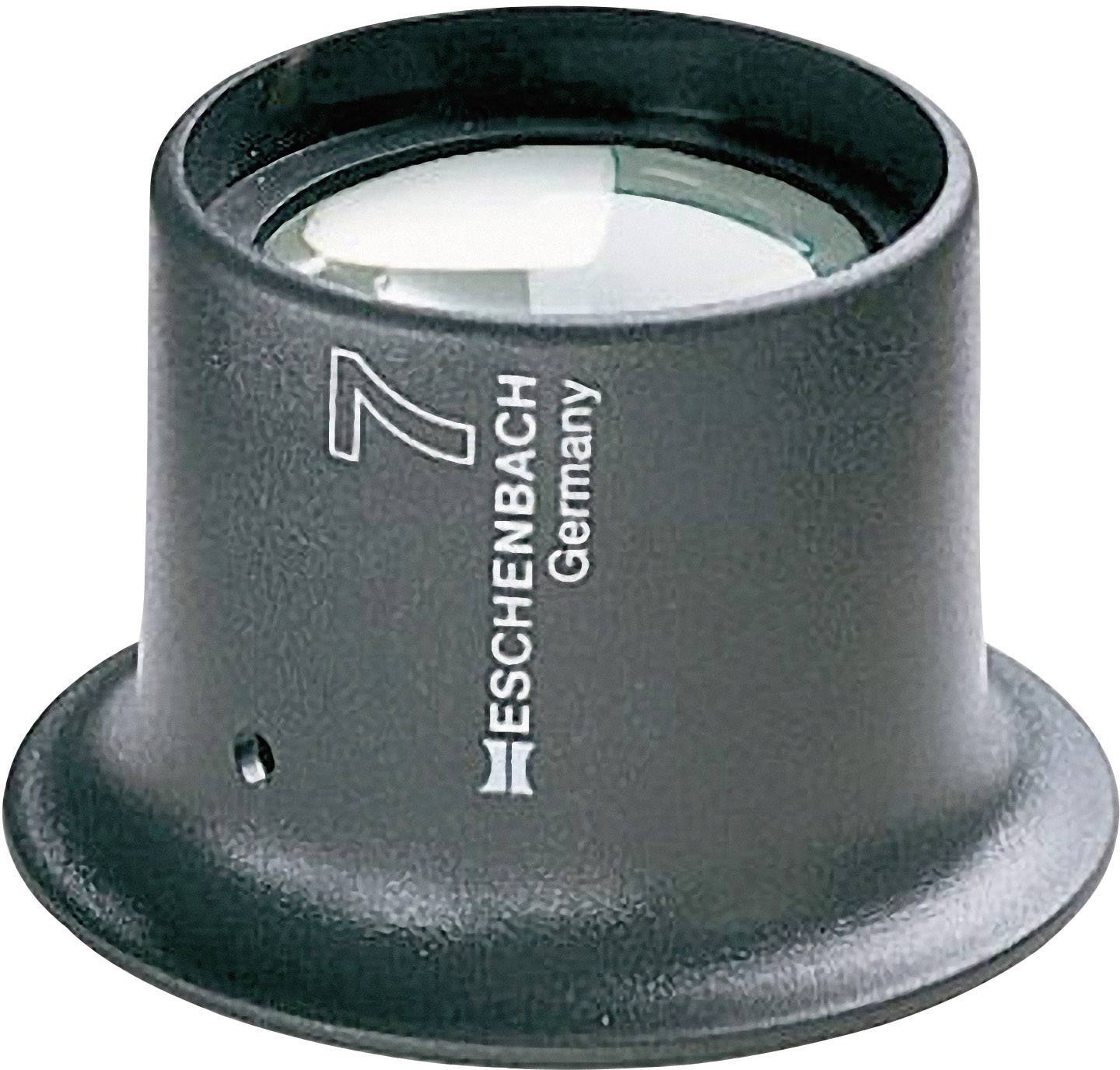 Loupe à boîtier noir, avec l'inscription 'ESCHENBACH Germany' et le chiffre 7 sur le côté.